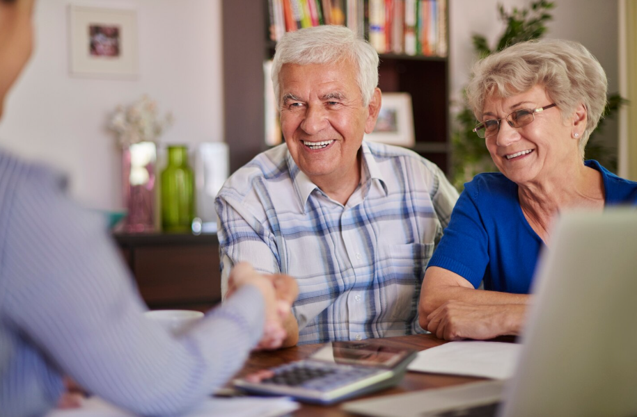 Senior couple meeting with an advisor to write a legally valid will