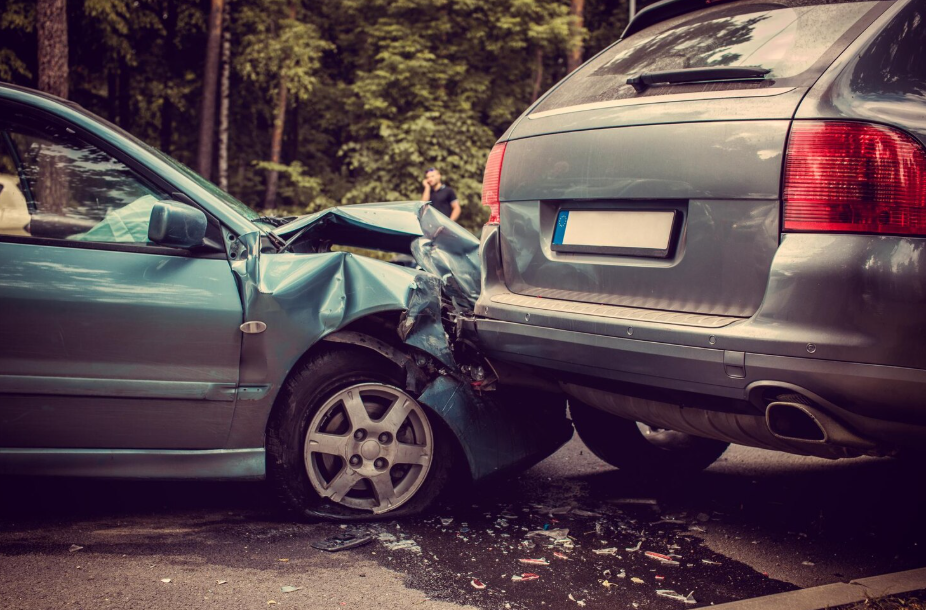 Two cars involved in a rear-end collision illustrating the legal steps after a car accident