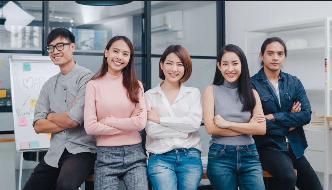 Diverse team of young professionals, representing modern employees and independent contractors.